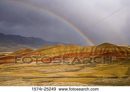 Rainbow over hills, Painted Hills, John Day Fossil Beds National Monument, Oregon, USA View Large Photo Image Stock Photo - Rainbow over hills, Painted Hills, John Day Fossil Beds National Monument, Oregon, USA. Fotosearch
