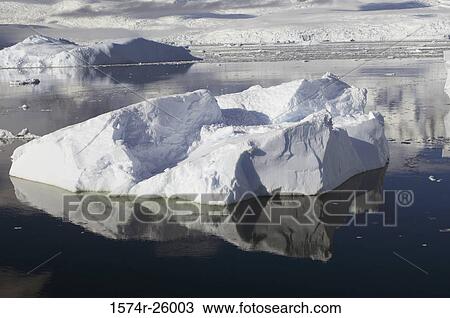 Reflection of icebergs in water View Large Photo Image Stock Image - Reflection of icebergs in water. Fotosearch