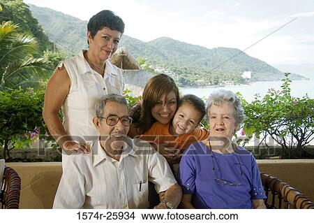 Senior couple with their family smiling View Large Photo Image Picture - Senior couple with their family smiling. Fotosearch