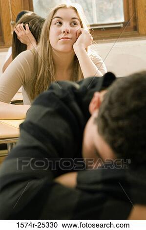 Student day dreaming in a classroom View Large Photo Image Stock Image - Student day dreaming in a classroom. Fotosearch