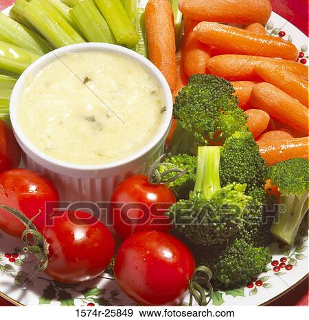 Vegetables with dip on a plate View Large Photo Image Stock Photo - Vegetables with dip on a plate. Fotosearch