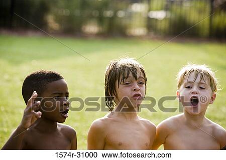 Bare chested boys making faces View Large Photo Image Stock Image - Bare chested boys making faces. Fotosearch