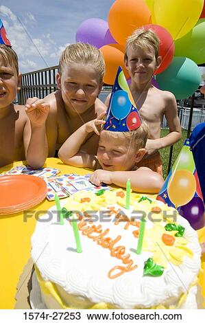 Boys and girls celebrating birthday party View Large Photo Image Stock Image - Boys and girls celebrating birthday party. Fotosearch