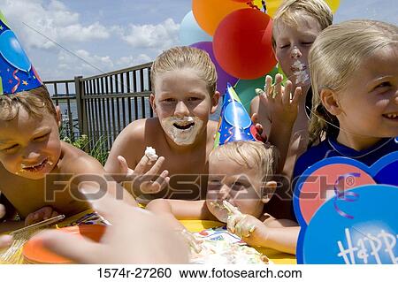 Boys and girls celebrating birthday party View Large Photo Image Stock Image - Boys and girls celebrating birthday party. Fotosearch