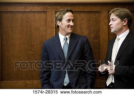 Stock Photography - Business people discussing in conference room. Fotosearch