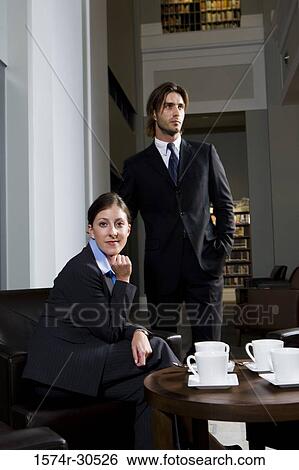 Stock Photograph - Business people in an office. Fotosearch