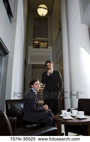 Business people in an office View Large Photo Image Stock Photography - Business people in an office. Fotosearch