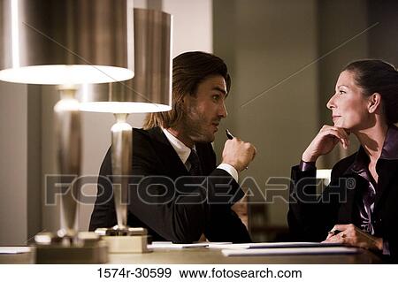 Business people planning in an office View Large Photo Image Stock Photo - Business people planning in an office. Fotosearch