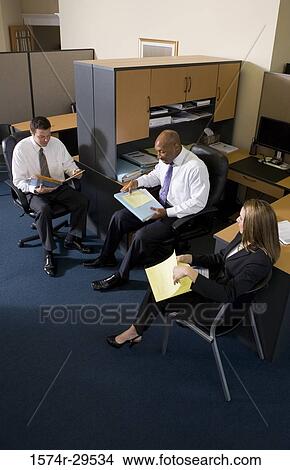 Business people working in an office View Large Photo Image Picture - Business people working in an office. Fotosearch