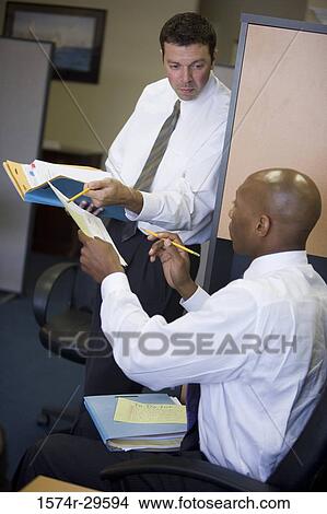 Business people working in an office View Large Photo Image Picture - Business people working in an office. Fotosearch