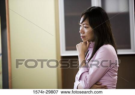 Stock Photo - Businesswoman looking away. Fotosearch
