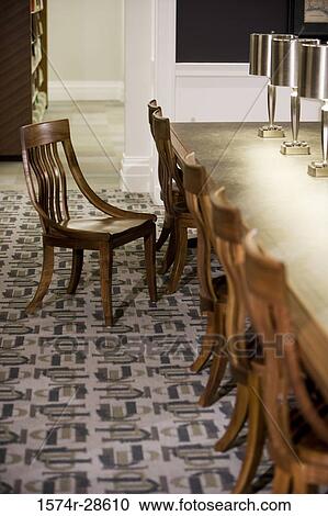 Chairs with table lamps on conference table in an office View Large Photo Image Stock Image - Chairs with table lamps on conference table in an office. Fotosearch