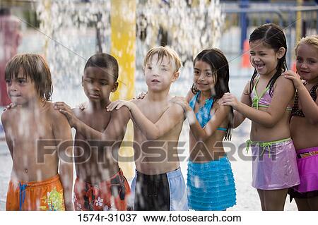 Children playing in water park View Large Photo Image Stock Photo - Children playing in water park. Fotosearch
