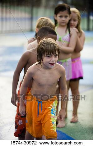 Children standing in a queue View Large Photo Image Stock Image - Children standing in a queue. Fotosearch