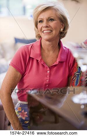 Stock Photograph - Close-up of a cheerful senior woman. Fotosearch