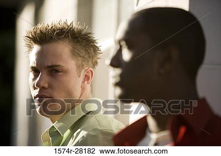 Close-up of a contemplative man View Large Photo Image Stock Image - Close-up of a contemplative man. Fotosearch
