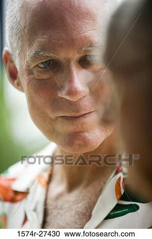 Close-up of a contemplative senior man View Large Photo Image Stock Image - Close-up of a contemplative senior man. Fotosearch