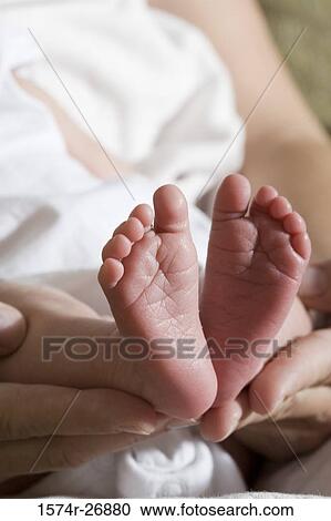 Close-up of a leg of a newborn baby View Large Photo Image Stock Image - Close-up of a leg of a newborn baby. Fotosearch