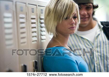 Close-up of student leaning by lockers View Large Photo Image Stock Image - Close-up of student leaning by lockers. Fotosearch