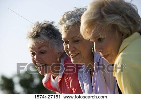 Close-up of three senior women looking away View Large Photo Image Stock Image - Close-up of three senior women looking away. Fotosearch