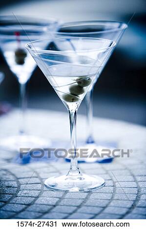 Stock Image - Close-up of wineglasses on the floor. Fotosearch