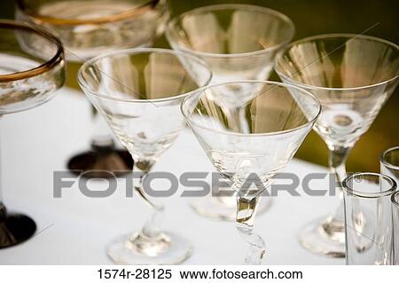 Collection of wineglasses on table View Large Photo Image Stock Photography - Collection of wineglasses on table. Fotosearch