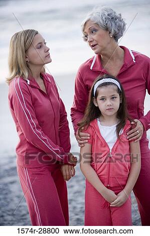 Grandmother with her daughter and granddaughter at the beach View Large Photo Image Stock Image - Grandmother with her daughter and granddaughter at the beach. Fotosearch
