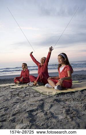 Grandmother with her daughter and granddaughter exercising at the beach View Large Photo Image Stock Photography - Grandmother with her daughter and granddaughter exercising at the beach. Fotosearch
