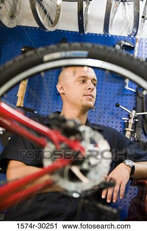 Man working in a workshop View Large Photo Image Stock Image - Man working in a workshop. Fotosearch