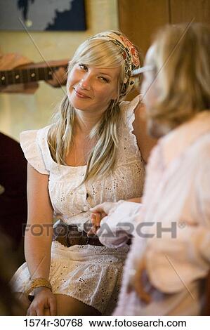 Mature woman looking at her husband View Large Photo Image Stock Photo - Mature woman looking at her husband. Fotosearch