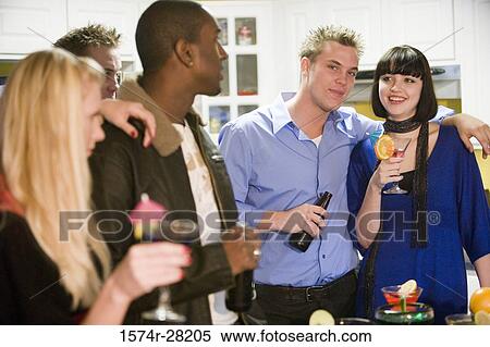 Men and women enjoying drinks View Large Photo Image Stock Photography - Men and women enjoying drinks. Fotosearch