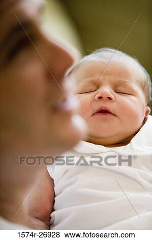 Mid adult man with his baby View Large Photo Image Stock Photo - Mid adult man with his baby. Fotosearch