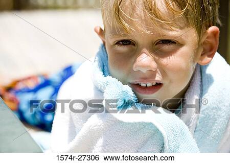 Portrait of a boy wrapped in towel View Large Photo Image Stock Photograph - Portrait of a boy wrapped in towel. Fotosearch