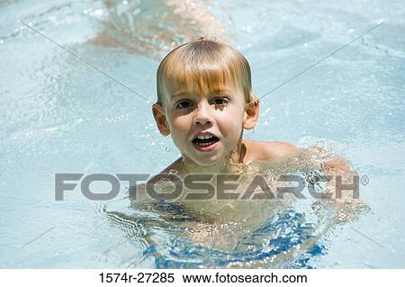 Portrait of a cheerful boys in swimming pool View Large Photo Image Stock Photography - Portrait of a cheerful boys in swimming pool. Fotosearch