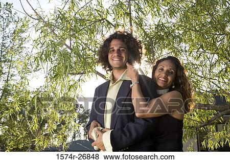 Portrait of a cheerful man and a mature woman standing together View Large Photo Image Stock Photo - Portrait of a cheerful man and a mature woman standing together. Fotosearch