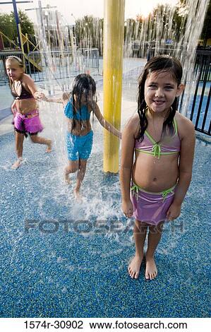 Portrait of a girl standing in front of a shower View Large Photo Image Stock Image - Portrait of a girl standing in front of a shower. Fotosearch