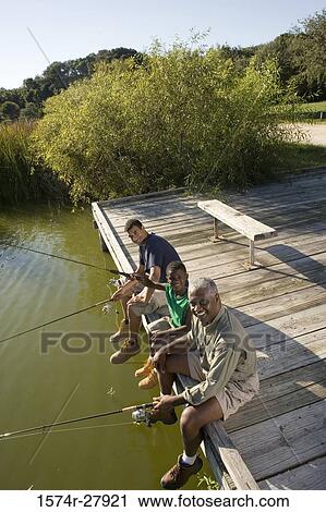 Portrait of a man fishing with his son and friend on jetty View Large Photo Image Stock Image - Portrait of a man fishing with his son and friend on jetty. Fotosearch