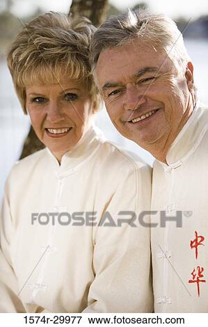 Stock Photo - Portrait of a mature couple smiling. Fotosearch