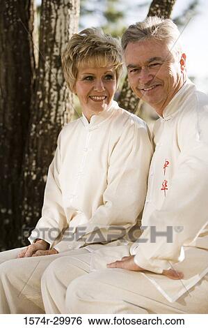 Portrait of a mature couple smiling View Large Photo Image Stock Photograph - Portrait of a mature couple smiling. Fotosearch