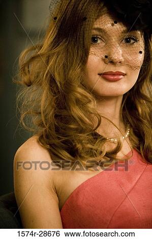 Portrait of a young prostitute in a red dress View Large Photo Image Stock Photograph - Portrait of a young prostitute in a red dress. Fotosearch