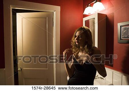 Portrait of a young prostitute in a gown leaning by sink View Large Photo Image Stock Photography - Portrait of a young prostitute in a gown leaning by sink. Fotosearch