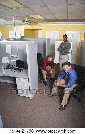 Portrait of businessmen by chart board in an office View Large Photo Image Stock Photograph - Portrait of businessmen by chart board in an office. Fotosearch