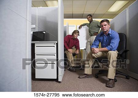 Portrait of businessmen by chart board in an office View Large Photo Image Stock Photography - Portrait of businessmen by chart board in an office. Fotosearch