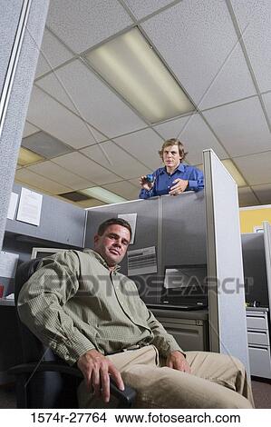 Portrait of businessmen sitting in an office View Large Photo Image Picture - Portrait of businessmen sitting in an office. Fotosearch