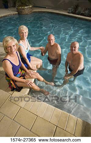 Portrait of senior couples at swimming pool View Large Photo Image Stock Photography - Portrait of senior couples at swimming pool. Fotosearch
