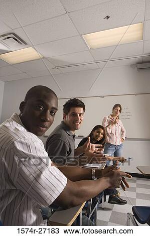 Portrait of university students in the classroom View Large Photo Image Stock Image - Portrait of university students in the classroom. Fotosearch