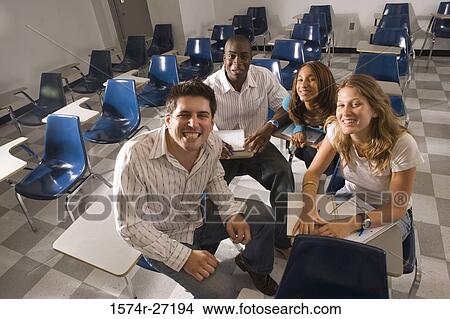 Portrait of university students smiling in the classroom View Large Photo Image Picture - Portrait of university students smiling in the classroom. Fotosearch