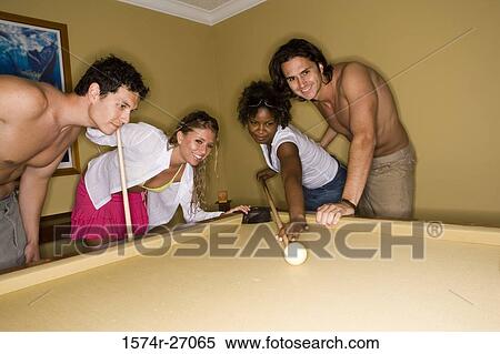 Shirtless young men playing pool with their girlfriends View Large Photo Image Stock Photography - Shirtless young men playing pool with their girlfriends. Fotosearch