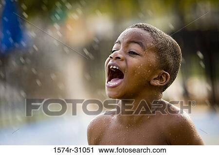 Side view of a boy shouting View Large Photo Image Stock Image - Side view of a boy shouting. Fotosearch