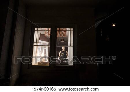 Silhouette of a house with a man standing in the background View Large Photo Image Stock Photography - Silhouette of a house with a man standing in the background. Fotosearch